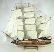 Wooden model of a three masted sailing ship,