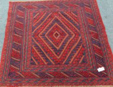 Tribal Gazak red and blue ground rug,