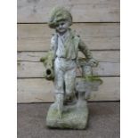 Composite stone garden water feature figure of a boy, with 'No Fishing' sign,