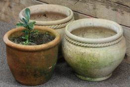 Pair terracotta plant pots with rope twist moulding and another terracotta plant pot
