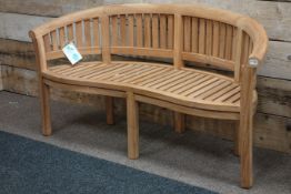 Solid teak curved garden bench,