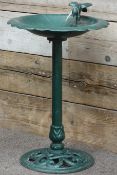 Green painted metal bird bath,