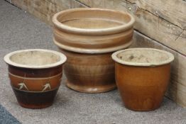 Salt glazed plant pot with leaf motifs,