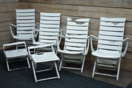 1960s set four white painted reclining garden armchairs, curved shaped,