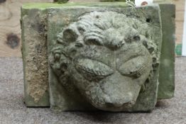 Moulded composite stone lion mask wall water feature on rectangular stone block