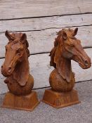 Pair cast iron horse head gatepost figures (looking left and right),