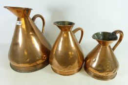 Matched set of three 19th Century copper jugs, marked 1,