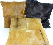 Three animal skin cushions 60cm x 60 cm approx (3) Condition Report <a