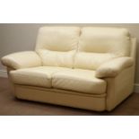 Two seat sofa upholstered in cream leather,