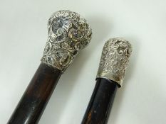 Early Victorian ebony walking stick with hallmarked silver top and another ebonised walking stick
