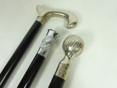 Ebonised 'Coldstream Guards' walking stick and two other ebonised walking sticks with silver plated