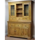 Oak kitchen dresser, six drawers and three cupboards, raised display cabinets and plate rack,