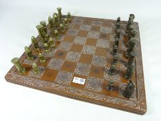 Chess set with bronze and brass pieces,