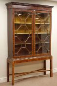 19th century mahogany bookcase on stand, two astragal glazed doors enclosing adjustable shelves,