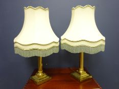 Pair of brass Corinthian column lamps (2) (This item is PAT tested - 5 day warranty from date of
