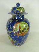 19th / early 20th Century Chinese vase and cover decorated with dragons and lime green panels on a