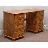 Pine twin pedestal dressing table/desk, eight drawers, W139cm, H74cm,