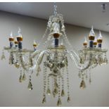 Large glass mounted ten branch chandelier with cut glass drops Condition Report