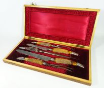 Early 20th Century four piece carving set with antler handles and silver plated mounts,