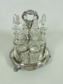 Edwardian silver plated cruet set with six cut glass bottles,