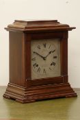 Early 20th century mahogany cased mantle clock, silvered dial with engraved detail,