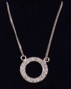 Brilliant cut diamond circle white gold pendant necklace hallmarked 18ct Condition Report