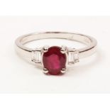 18ct white gold oval ruby and baguette diamond shoulder ring hallmarked Condition Report