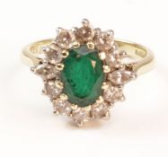 Emerald and diamond cluster hallmarked 18ct Condition Report <a href='//www.