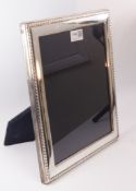 Hallmarked silver mounted photograph frame gadrooned border 31cm x 26cm Condition Report