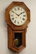 Early 20th century oak octagonal cased drop dial wall clock,
