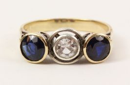 Sapphire and diamond three stone rim set gold ring stamped 585 Condition Report