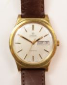 Gentleman's Omega automatic gold-plated and steel wristwatch with date aperture on leather strap