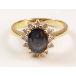 Sapphire and diamond cluster ring stamped 750 Condition Report <a href='//www.