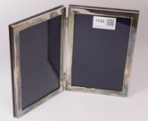 Hallmarked silver mounted double folding photograph frame 17cm x 12cm closed Condition
