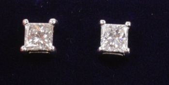 Pair of white gold princess cut diamond stud ear-rings stamped 750 Condition Report