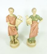 Pair of Royal Dux figures of water carriers, H31.