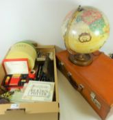 Vintage suitcase, enamelled cake tin, globe lamp,