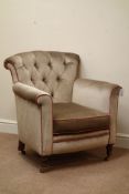 Early 20th century walnut framed armchair, turned front legs with castors, upholstered in dralon,