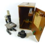 Prior London microscope with accessories in fitted case and a additional lens by Ross,