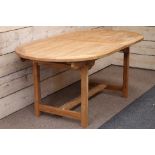 Solid teak extending garden table with foldout leaf,