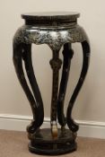 Japanese style black lacquered plant stand on five shaped supports, gilt decoration, D40cm (top),