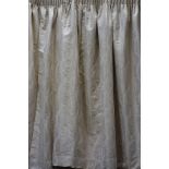 Pair lined pleated curtains in pale gold fabric, with pull backs, W285cm,