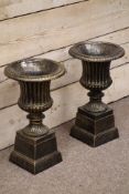 Pair small Victorian style Campana bronze finish cast iron urns on plinths, D29cm, H50cm