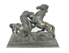 Large bronze effect sculpture of a mare and stallion,