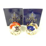 Two Royal Crown Derby paperweights;