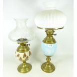 Two early to mid 20th century oil lamps with glass shades (2) Condition Report