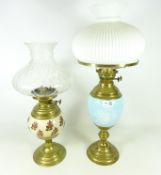 Two early to mid 20th century oil lamps with glass shades (2) Condition Report