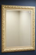 Large gilt framed mirror with moulded foliate boarder, bevelled glass,
