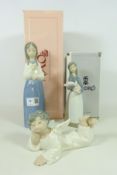 Two Lladro figurines and a Nao girl,