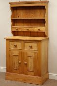 Polished pine side cabinet, single drawer above double cupboard,